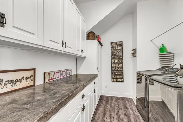 a kitchen with a sink and a stove
