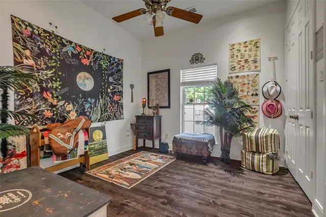 a living room with furniture and a window