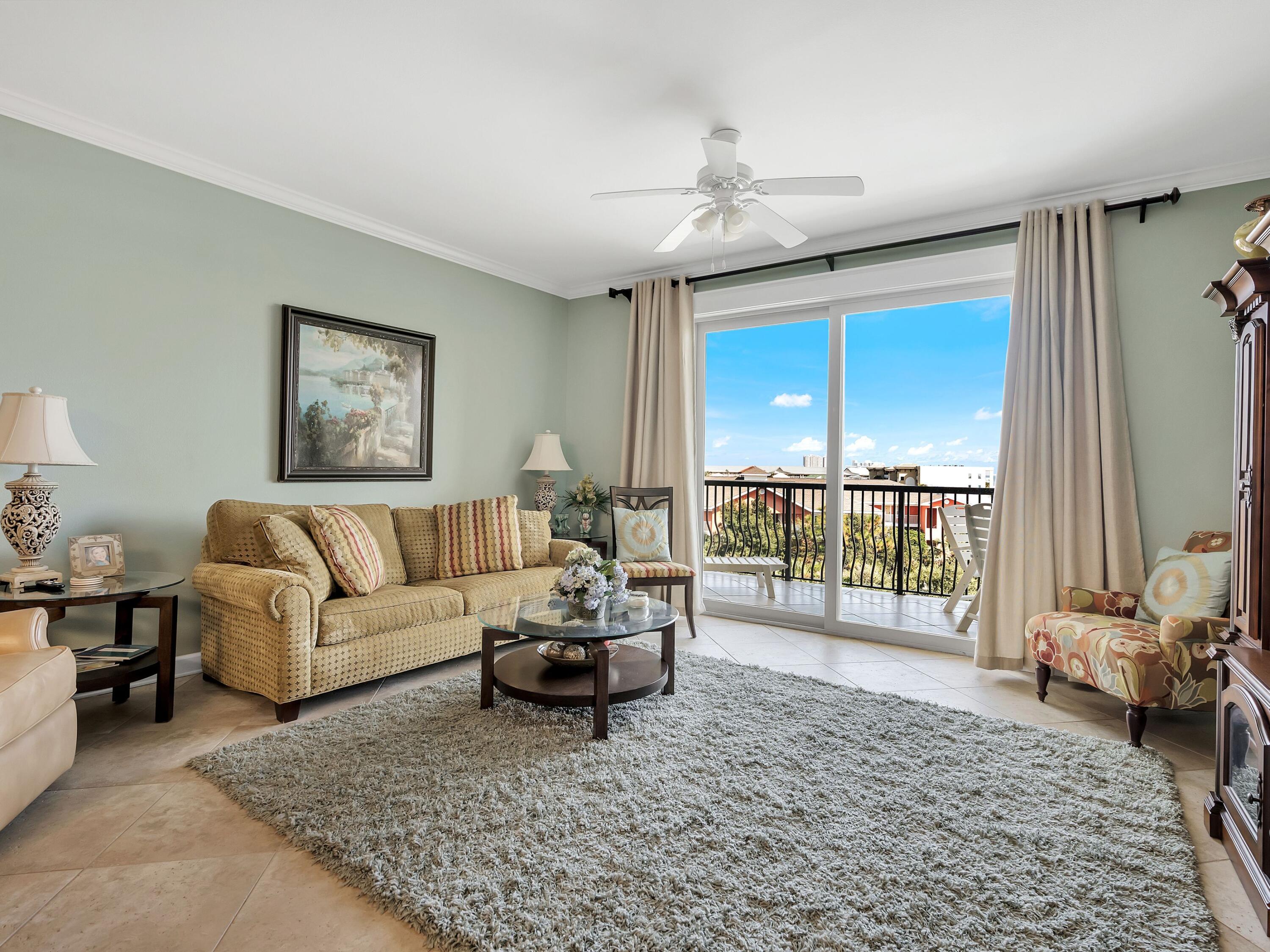 548 Sandy Cay Drive, Unit 510 Miramar Beach, FL 32550 - Photo 12 of 30 a living room with furniture and a large window