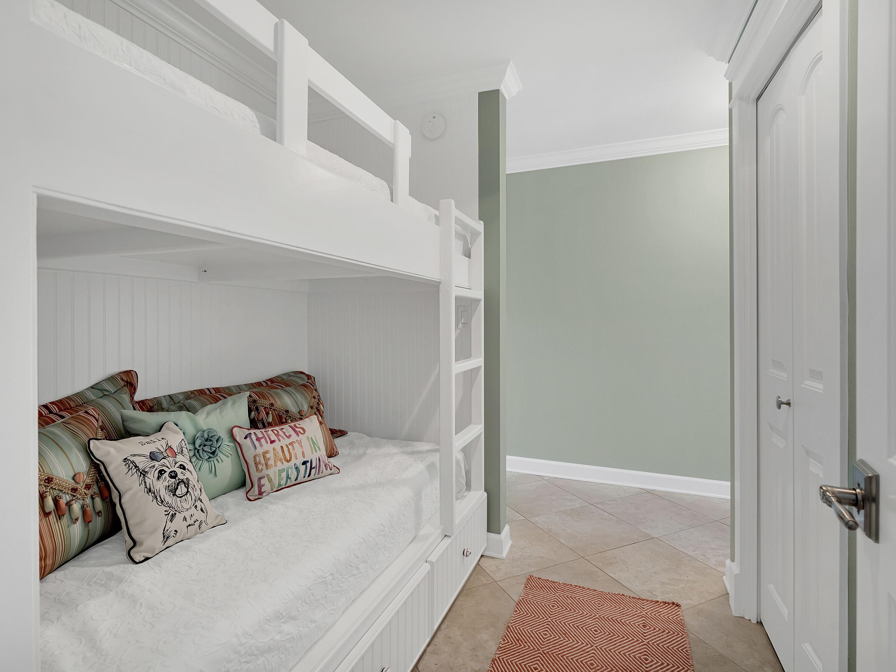 548 Sandy Cay Drive, Unit 510 Miramar Beach, FL 32550 - Photo 19 of 30 a bedroom with a bed and a rug