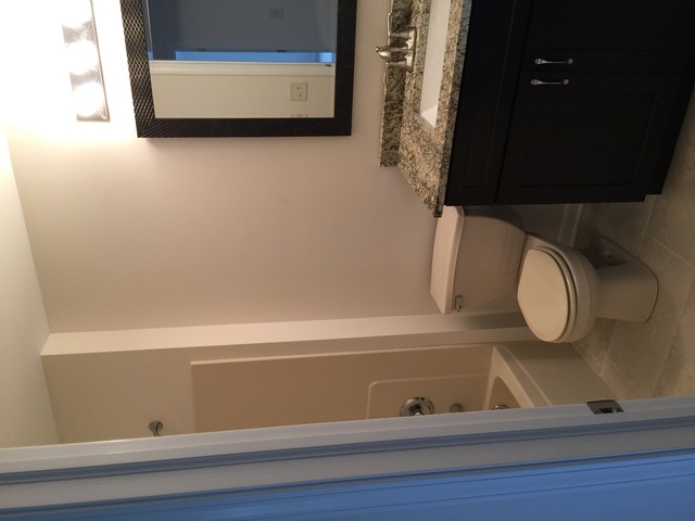 326 Prairie Ridge Drive Minooka, IL 60447 - Photo 9 of 16 a bathroom with a sink and a mirror