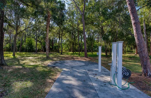 a view of swimming pool with sitting area