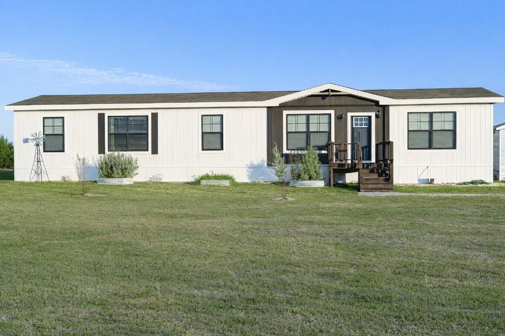 4504 Bethany Road Sherman, TX 75090 - Photo 1 of 20 a front view of house with yard and green space