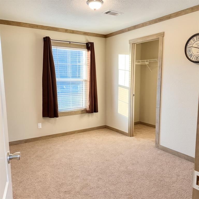 4504 Bethany Road Sherman, TX 75090 - Photo 11 of 20 an empty room with windows