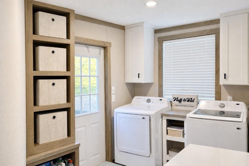 4504 Bethany Road Sherman, TX 75090 - Photo 13 of 20 a utility room with dryer washer and a window
