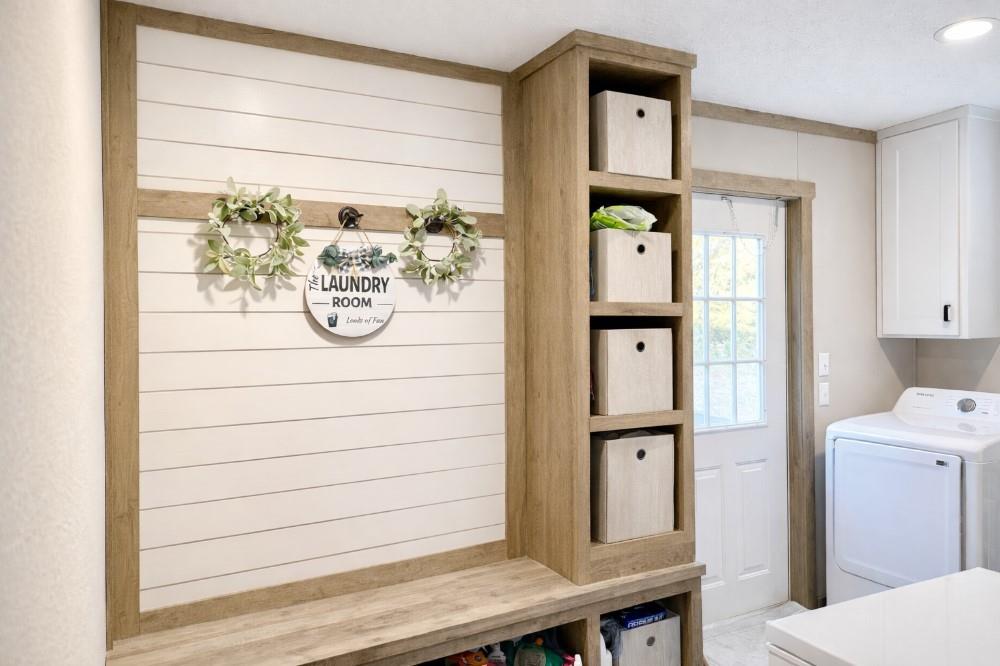 4504 Bethany Road Sherman, TX 75090 - Photo 14 of 20 a hallway with front door wooden cabinet and stairs