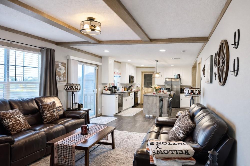 4504 Bethany Road Sherman, TX 75090 - Photo 4 of 20 a living room with furniture kitchen view and a large window