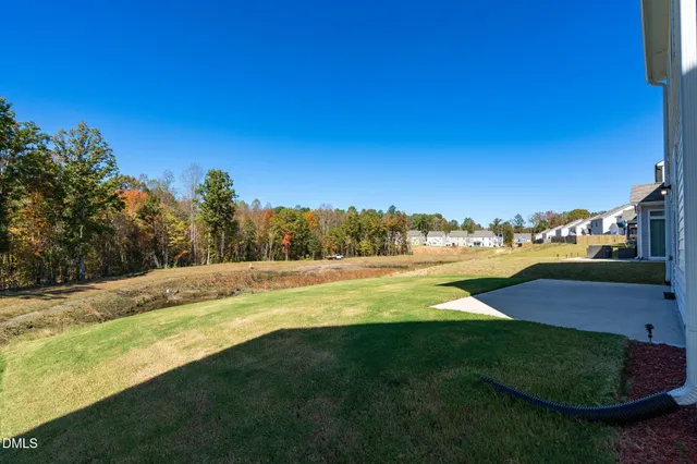 a bathroom with a sink double vanity and a toilet