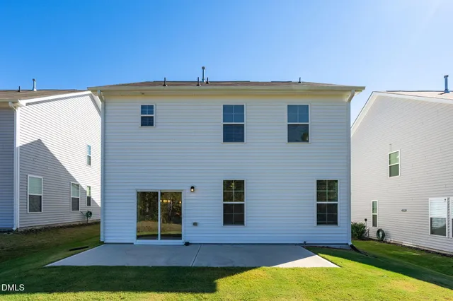 a view of an outdoor space and basketball court