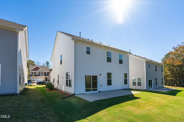 a view of a house with a big yard
