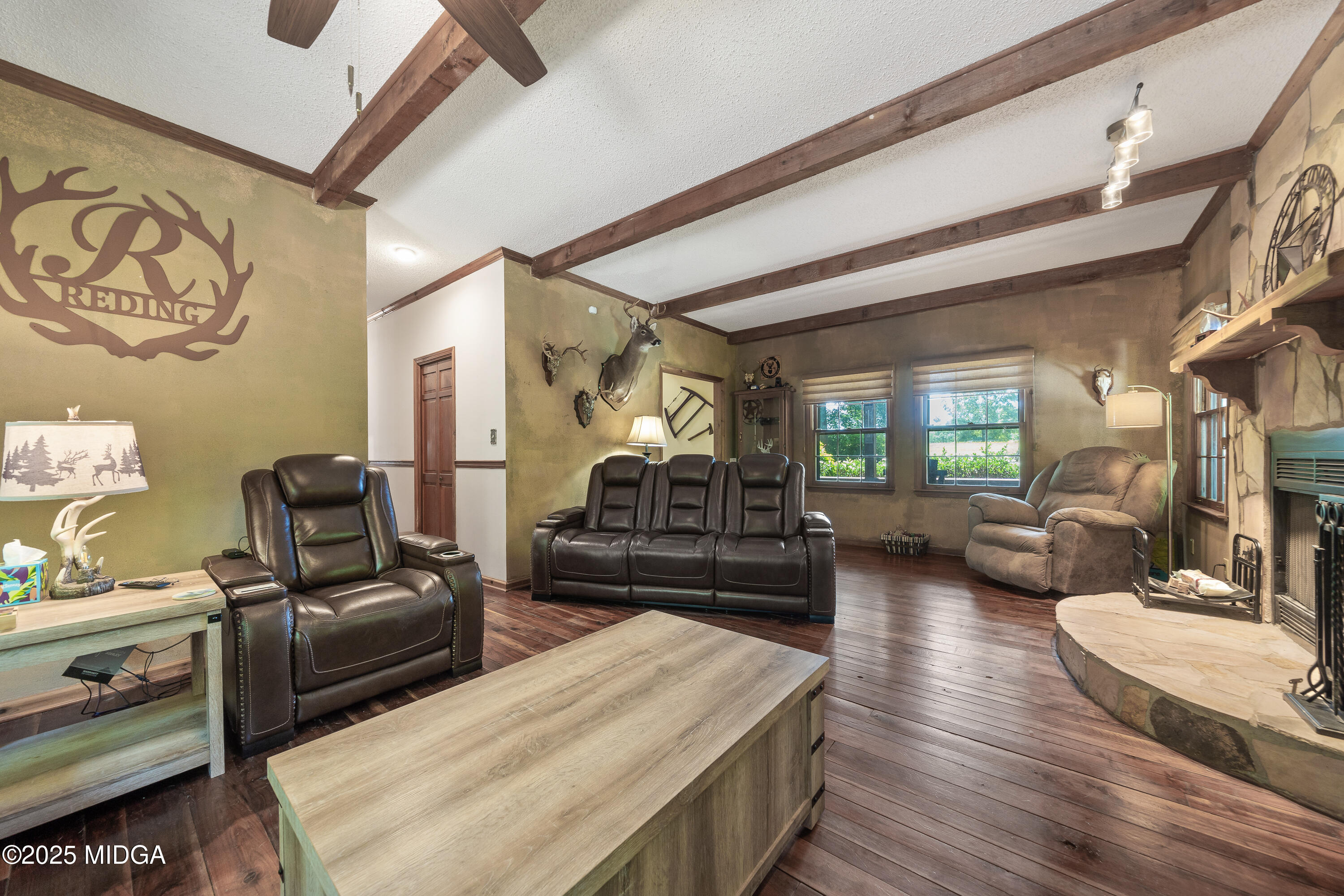 1627 Leguin Mill Road Locust Grove, GA 30248 - Photo 22 of 49 a living room with furniture
