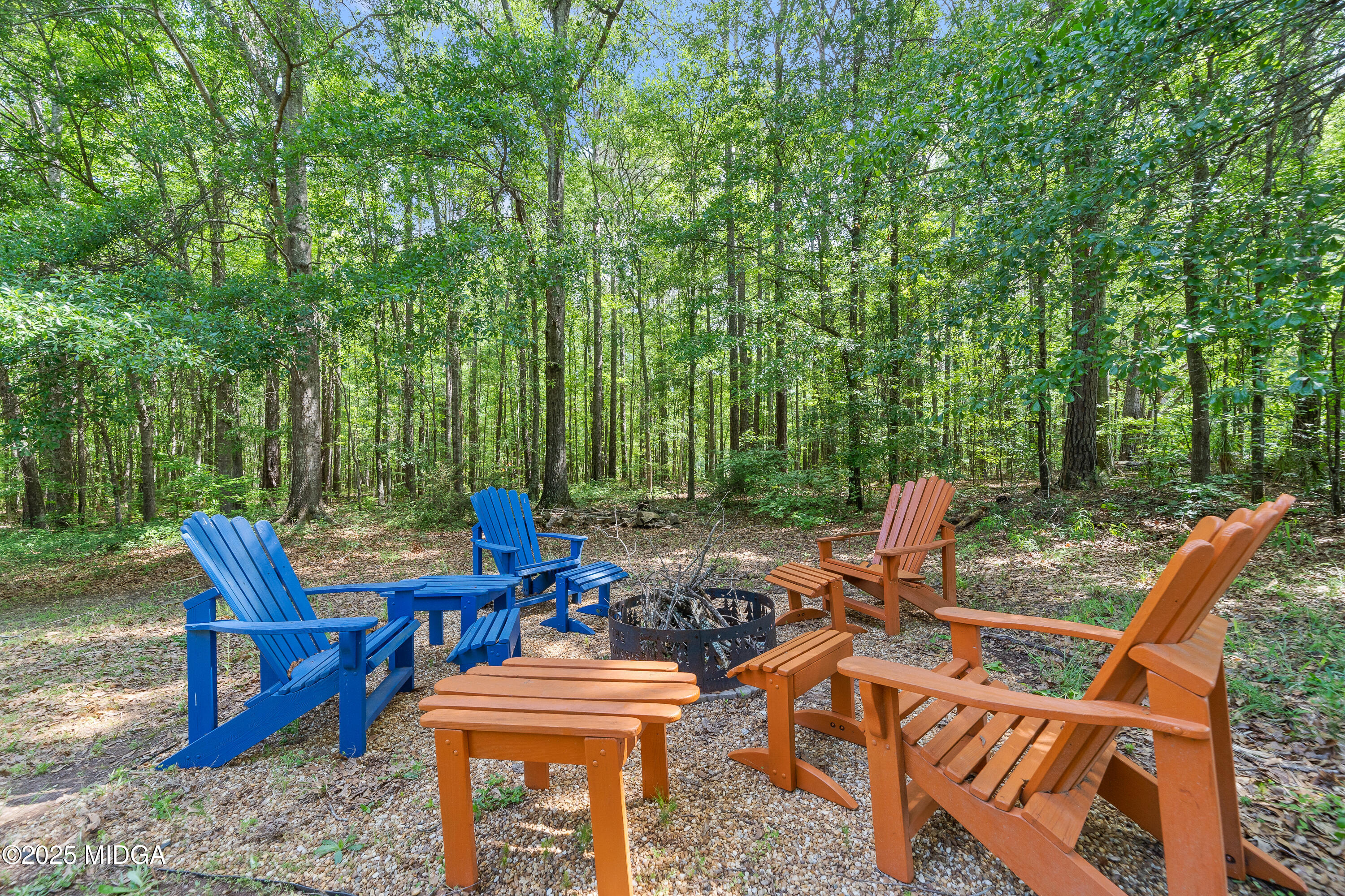 1627 Leguin Mill Road Locust Grove, GA 30248 - Photo 10 of 49 a view of an outdoor sitting area with chairs