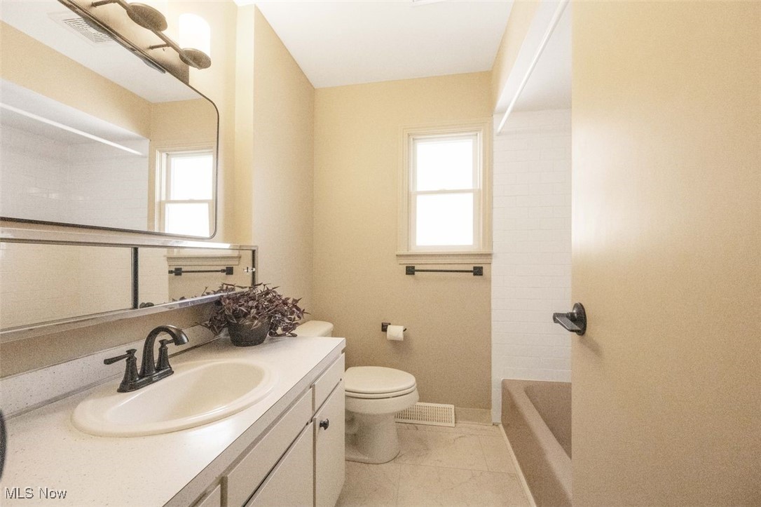 1586 Norledge Road Akron, OH 44305 - Photo 18 of 24 Bathroom featuring vanity and healthy amount of natural light