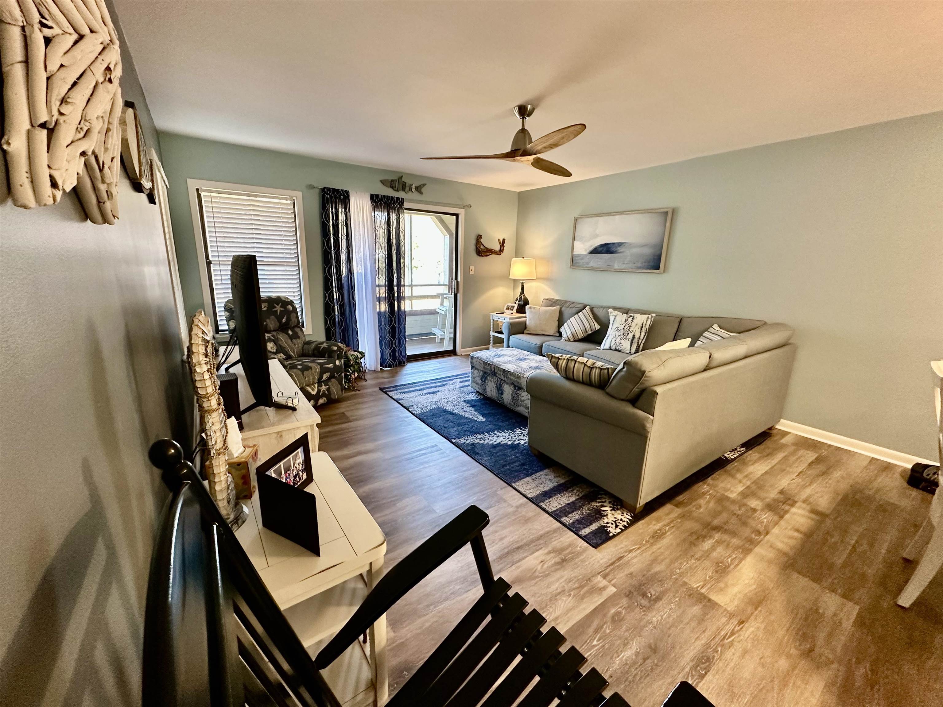 501 Maison Drive, Unit C9 Myrtle Beach, SC 29572 - Photo 18 of 27 Living area with light wood-type flooring and ceiling fan
