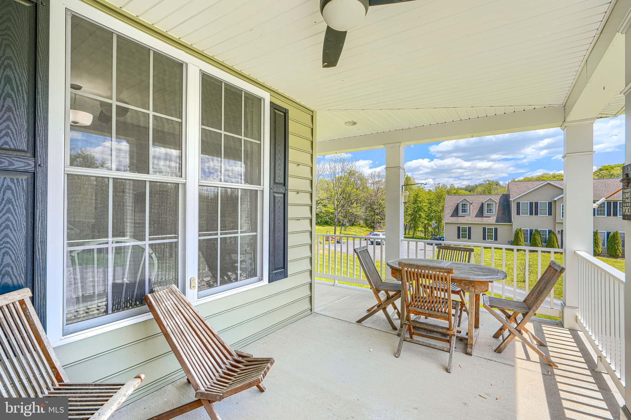 13012 Liberty Road Union Bridge, MD 21791 - Photo 4 of 47 a view of a house with backyard porch and sitting area