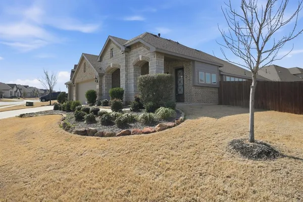 a view of a house with a snow in the yard