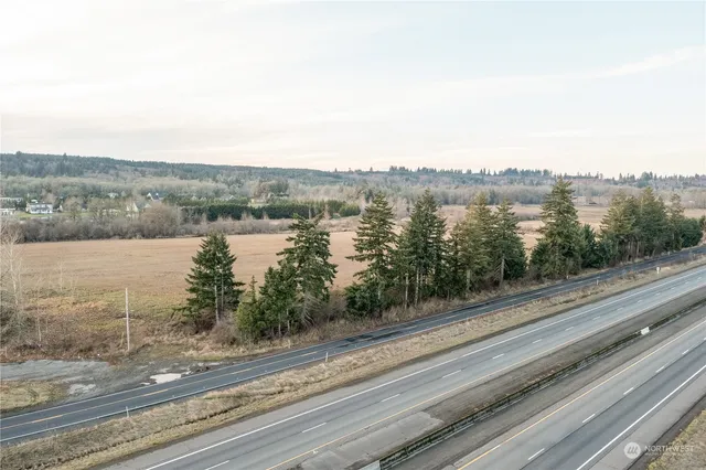 a view of a lake from a balcony