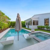 a view of a house with a swimming pool