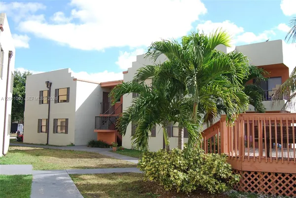 a view of a house with a garden