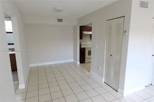a view of an empty room and window