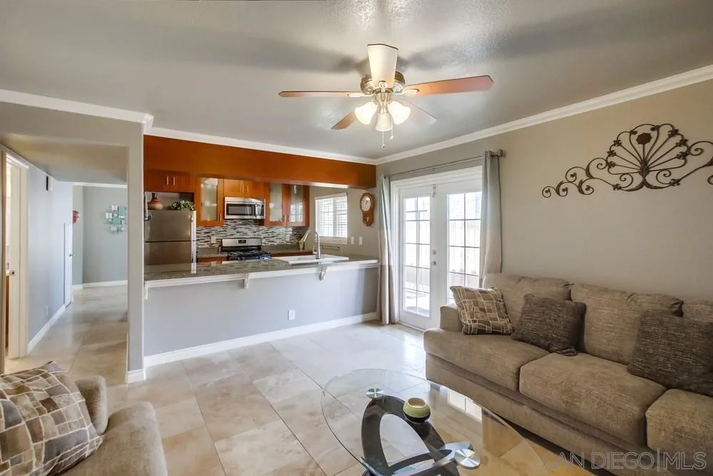 880 Friendly Circle El Cajon, CA 92021 - Photo 14 of 27 a living room with furniture and kitchen area