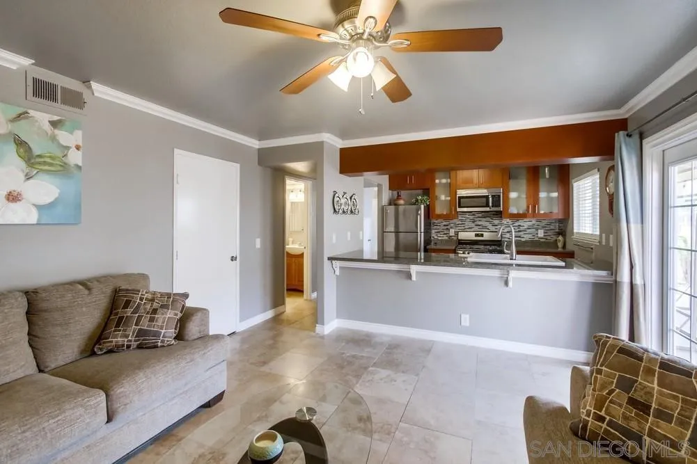 880 Friendly Circle El Cajon, CA 92021 - Photo 15 of 27 a living room with furniture and kitchen view