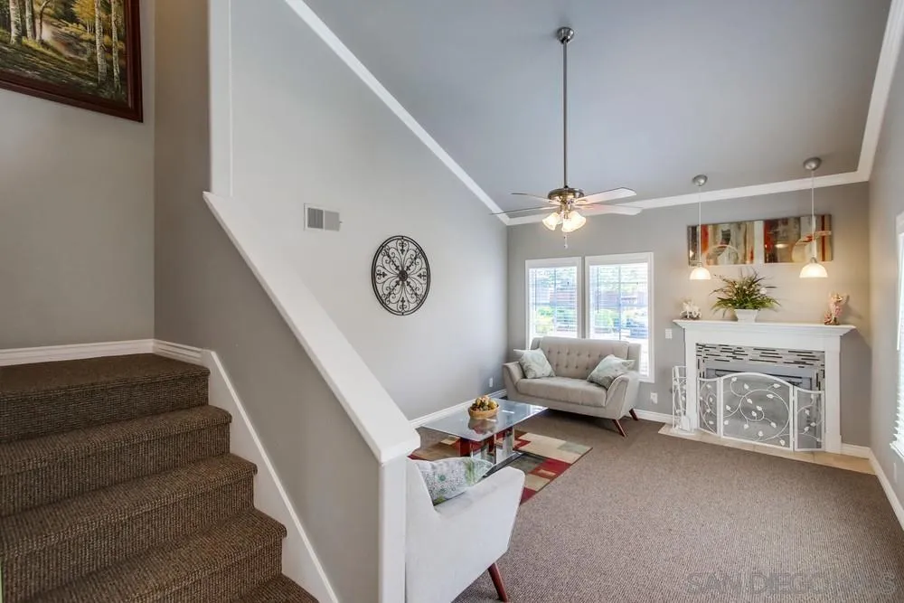 880 Friendly Circle El Cajon, CA 92021 - Photo 2 of 27 a living room with furniture and a chandelier