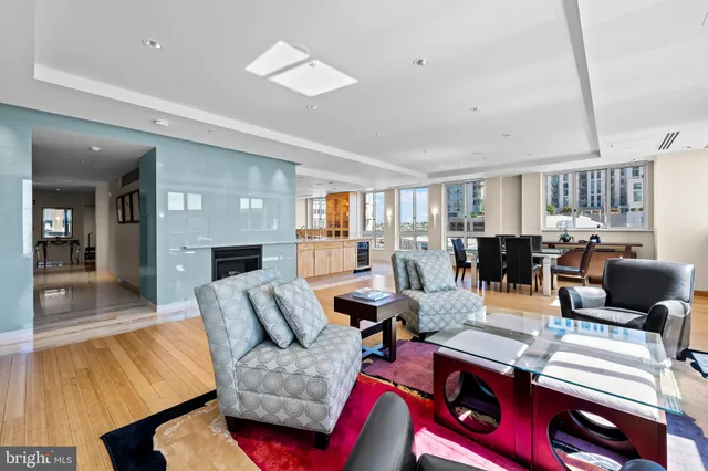 a kitchen with stainless steel appliances granite countertop a stove and a cabinet