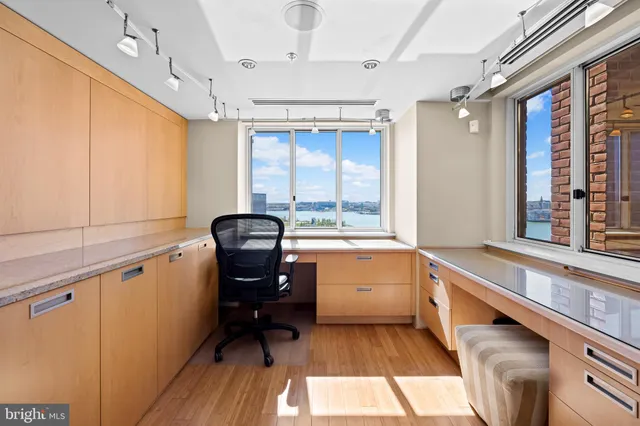 a bathroom with a bathtub and a sink