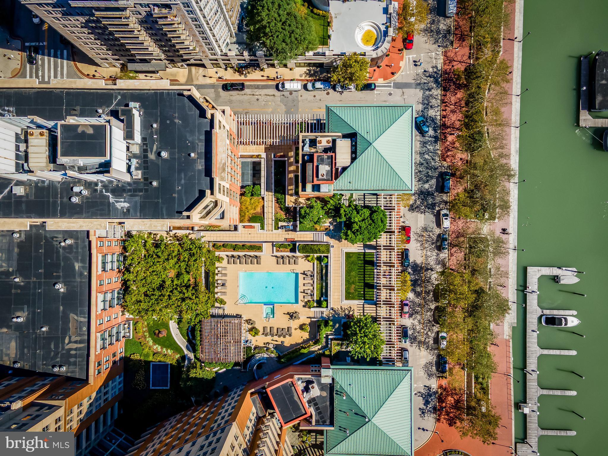 717 President Street, Unit PH802 Baltimore, MD 21202 - Photo 54 of 77 an aerial view of a house with a yard