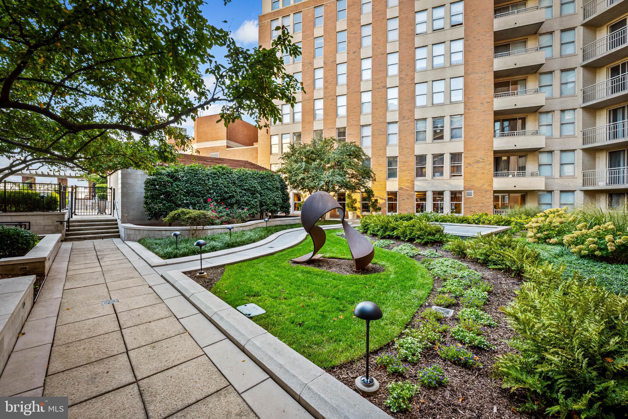 717 President Street, Unit PH802 Baltimore, MD 21202 - Photo 56 of 77 a view of a garden with a pathway