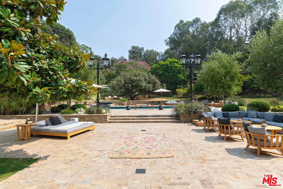 6238 Bonsall Drive Malibu, CA 90265 - Photo 25 of 40 a view of outdoor space with seating area and trees around