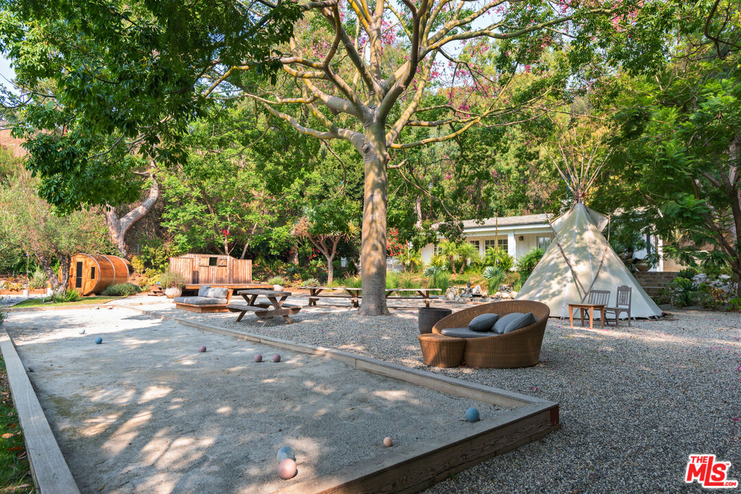 6238 Bonsall Drive Malibu, CA 90265 - Photo 35 of 40 a view of a backyard with sitting area