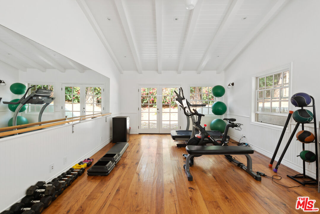 6238 Bonsall Drive Malibu, CA 90265 - Photo 40 of 40 a view of a room with gym equipment and a window