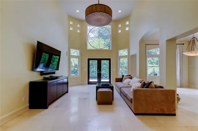 a kitchen with granite countertop a stove and a microwave