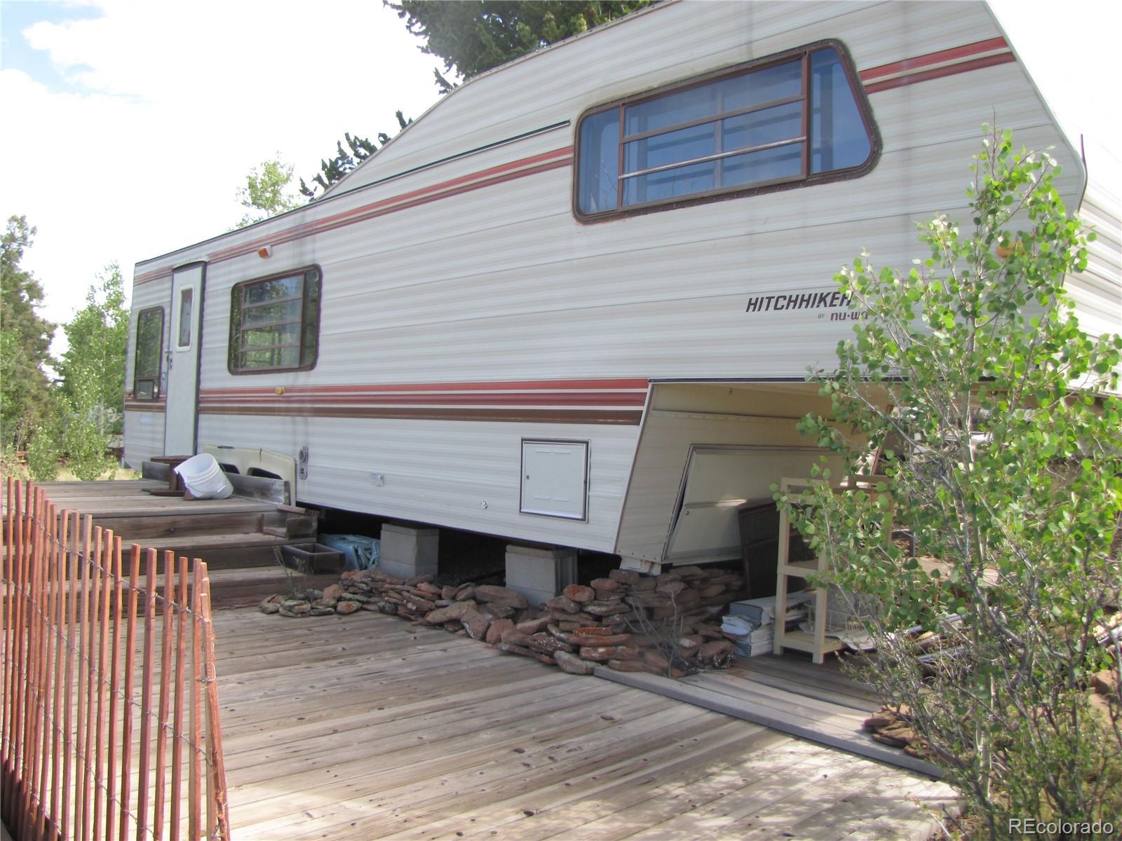 1808 Narrow Gauge Road Fairplay, CO 80440 - Photo 16 of 33 a front view of a house with garden