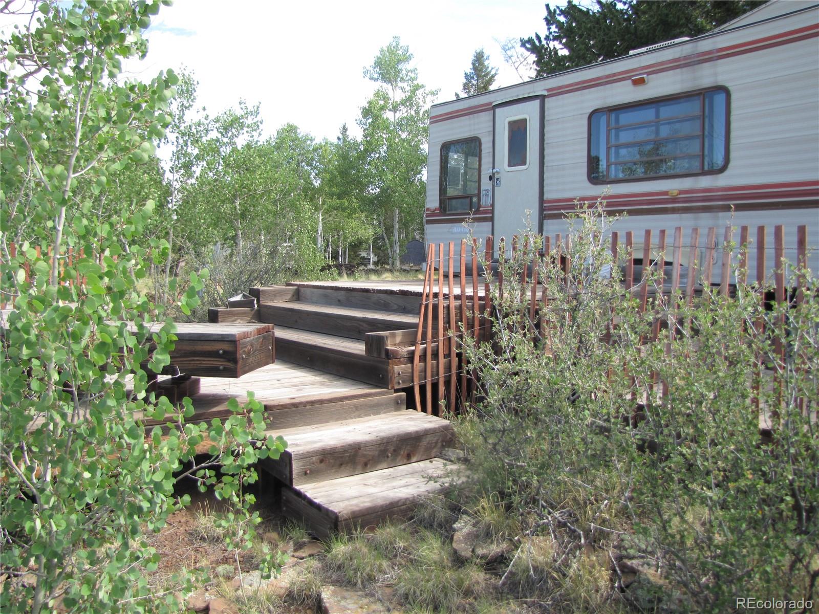 1808 Narrow Gauge Road Fairplay, CO 80440 - Photo 18 of 33 a view of a house with backyard and sitting area