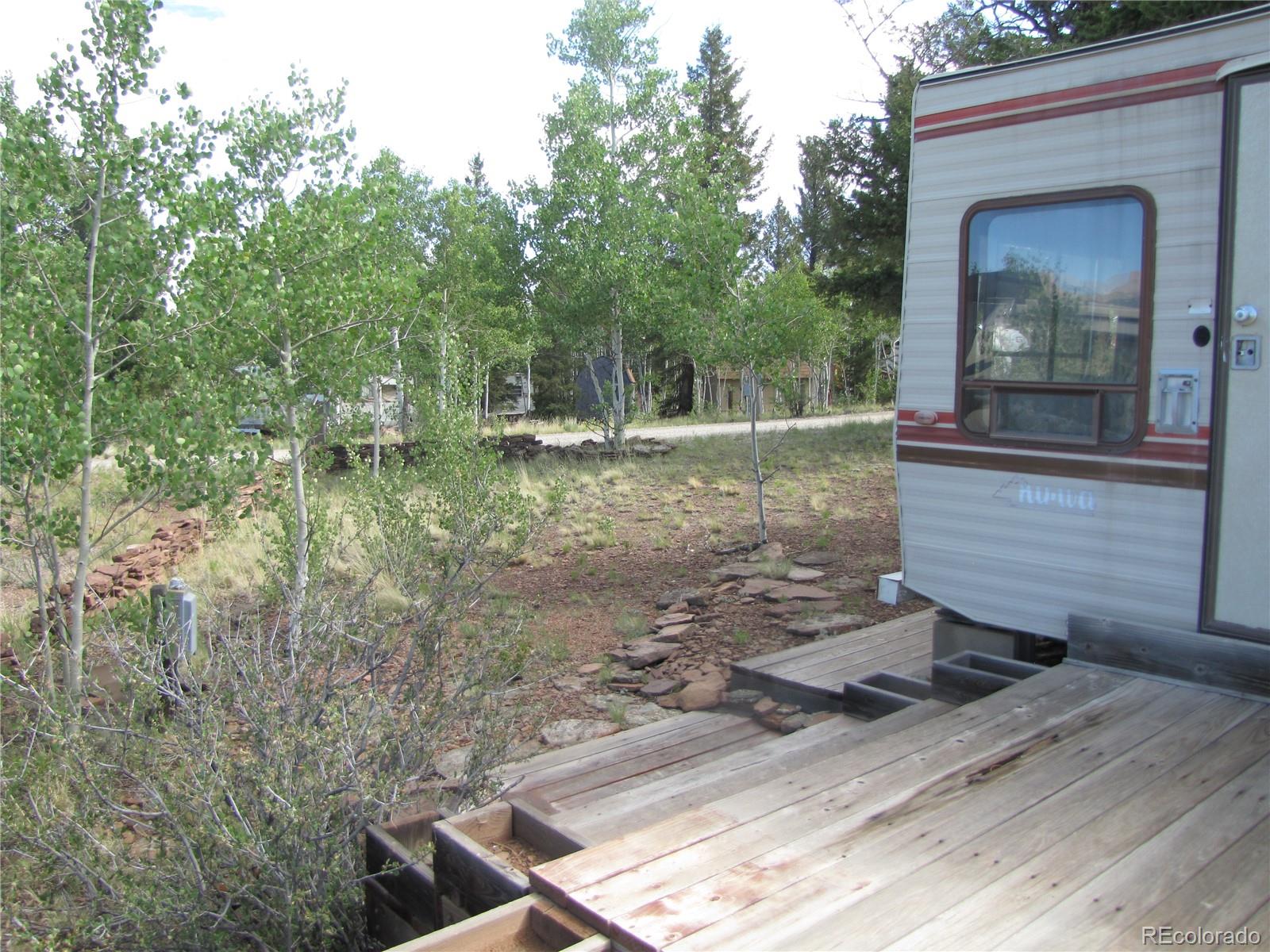 1808 Narrow Gauge Road Fairplay, CO 80440 - Photo 19 of 33 a view of a house with a yard