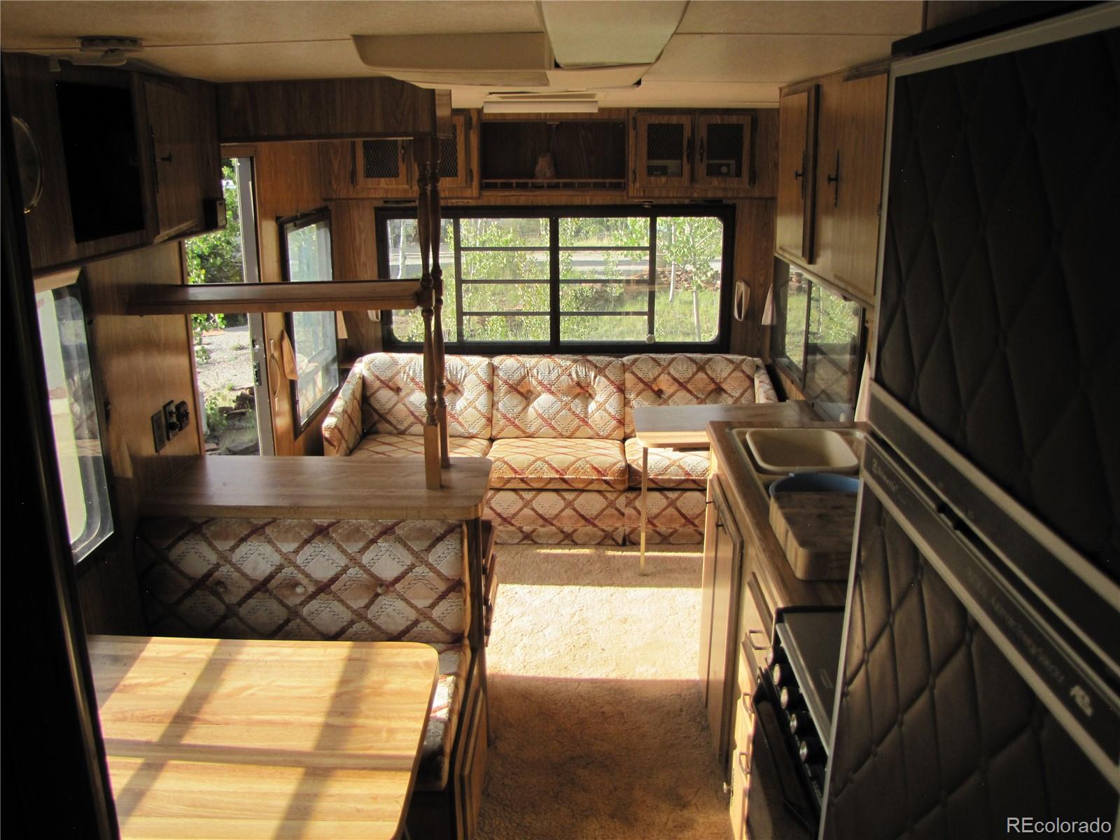 1808 Narrow Gauge Road Fairplay, CO 80440 - Photo 26 of 33 a view of a living room and dining room