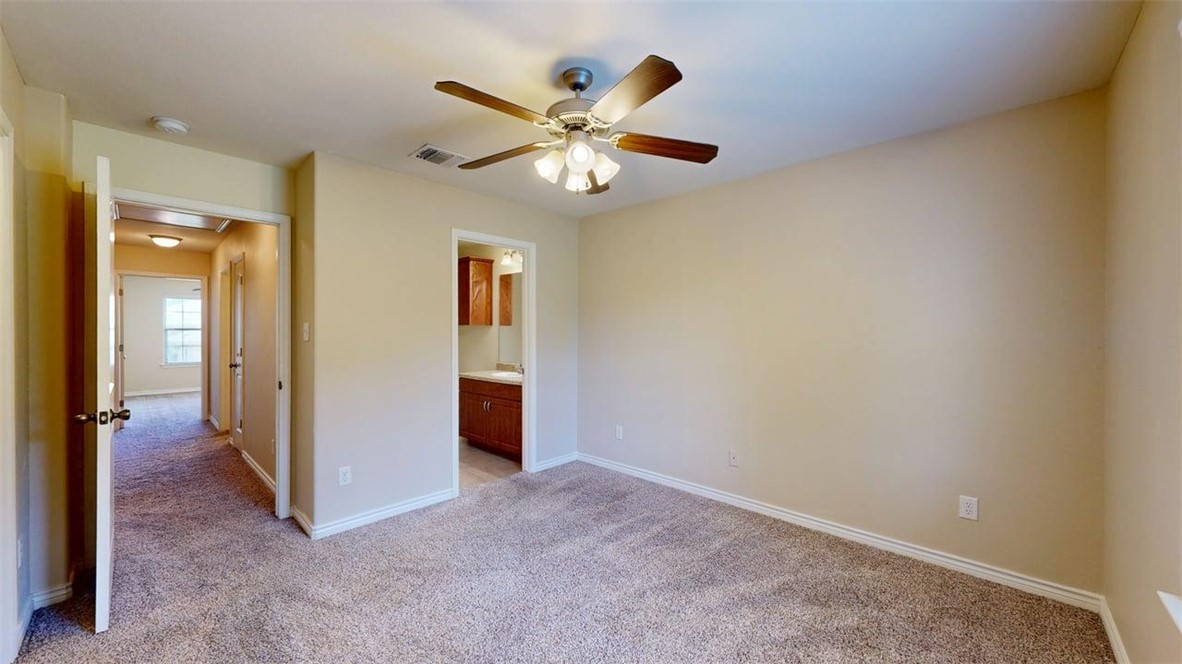 4436 Reveille Road College Station, TX 77845 - Photo 15 of 31 wooden floor in an empty room and a window