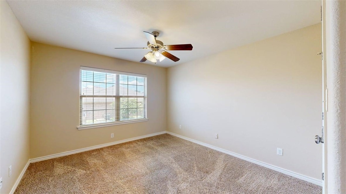 4436 Reveille Road College Station, TX 77845 - Photo 20 of 31 an empty room with windows and fan