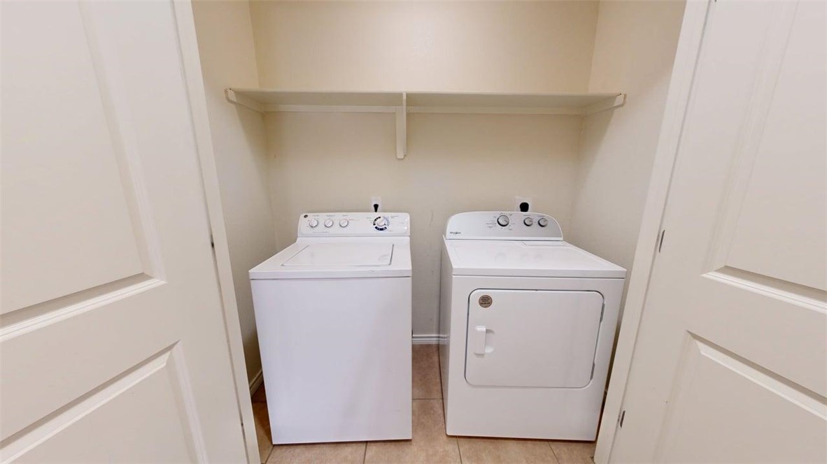 4436 Reveille Road College Station, TX 77845 - Photo 24 of 31 a utility room with dryer and washer