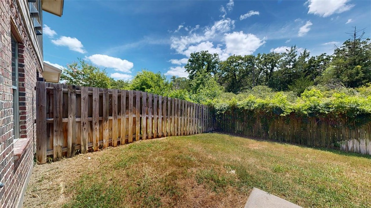4436 Reveille Road College Station, TX 77845 - Photo 27 of 31 a view of a backyard of the house