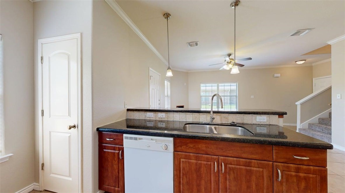 4436 Reveille Road College Station, TX 77845 - Photo 7 of 31 a view of a double sink and chandelier