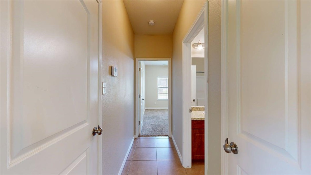 4436 Reveille Road College Station, TX 77845 - Photo 9 of 31 a bathroom with a bathtub and a shower