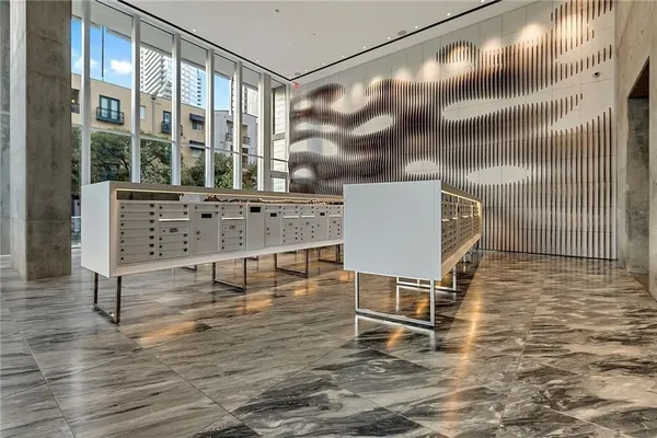 a view of a chairs and table in the room