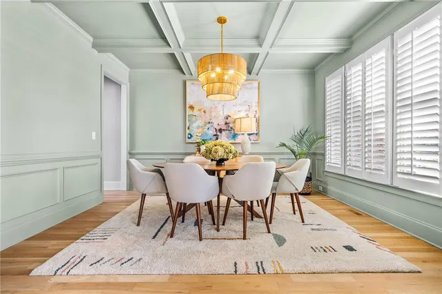 a living room with furniture fireplace and flat screen tv