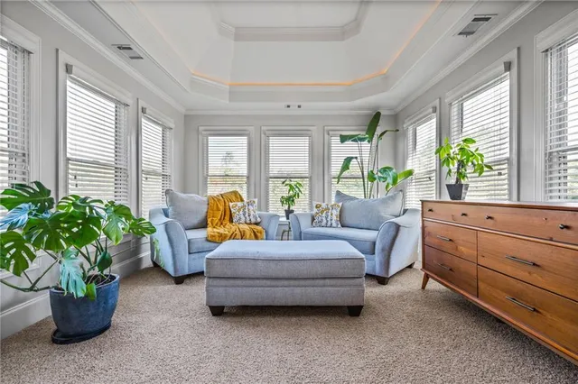 a bathroom with a sink mirror and vanity