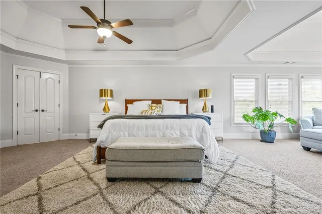 a living room with lots of furniture and gym equipment