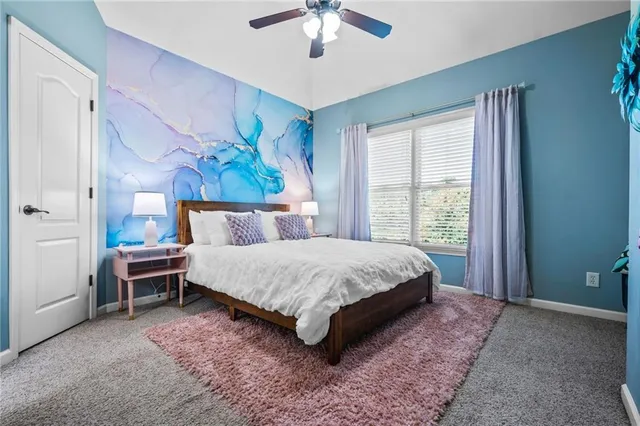 a kitchen with stainless steel appliances granite countertop a sink and stove